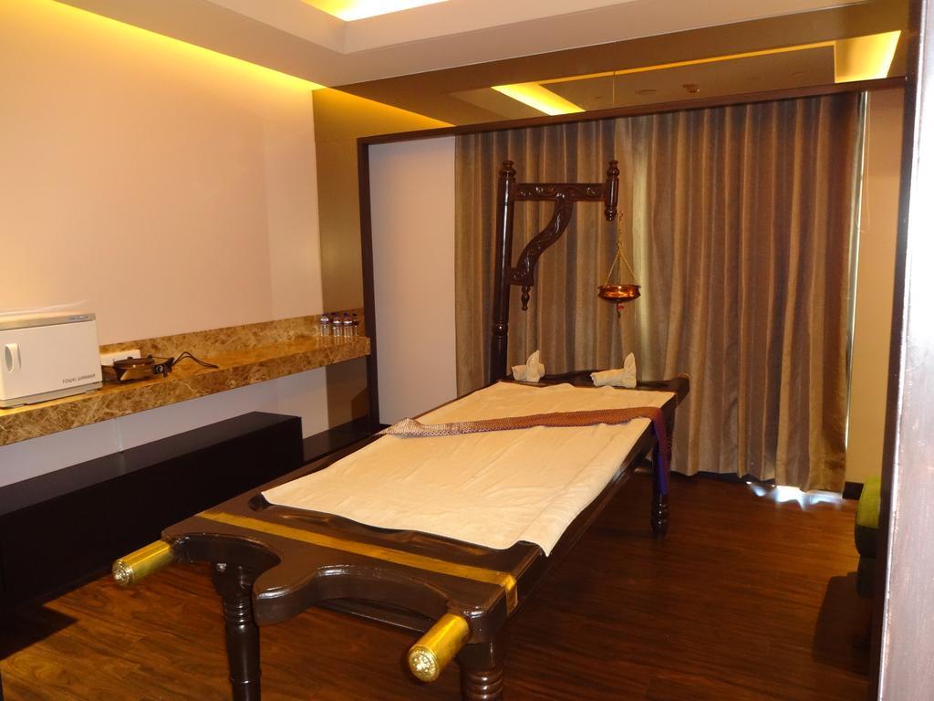 Radisson Blu Coimbatore Hotel Exterior photo Ayurvedic massage table