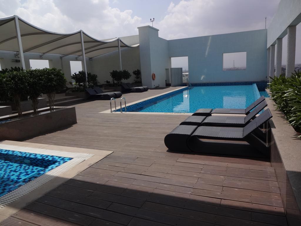 Radisson Blu Coimbatore Hotel Exterior photo Rooftop pool at the hotel