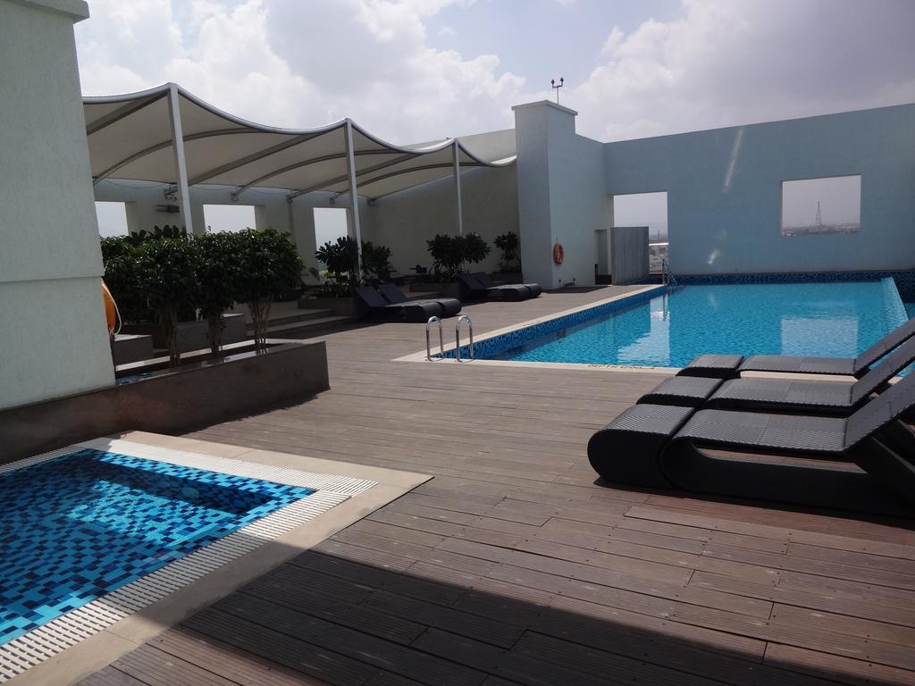 Radisson Blu Coimbatore Hotel Exterior photo Rooftop pool at the hotel